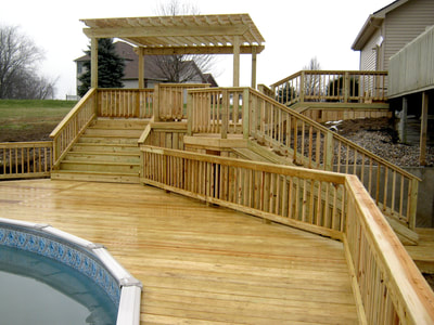 wood deck construction around pool